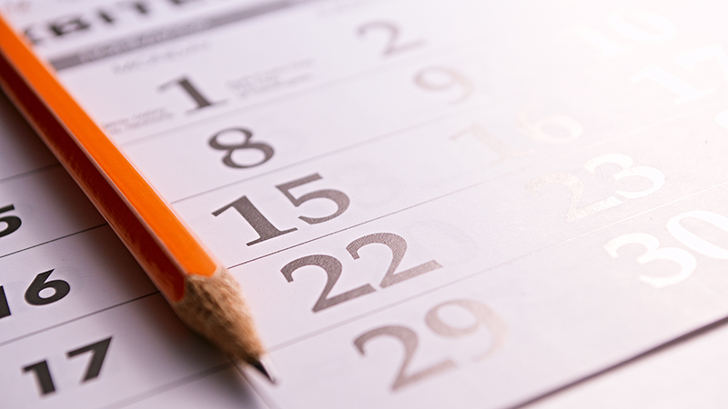 Close-up of a sharp pencil on the page of a calendar marking the date when home inspection services occurred 